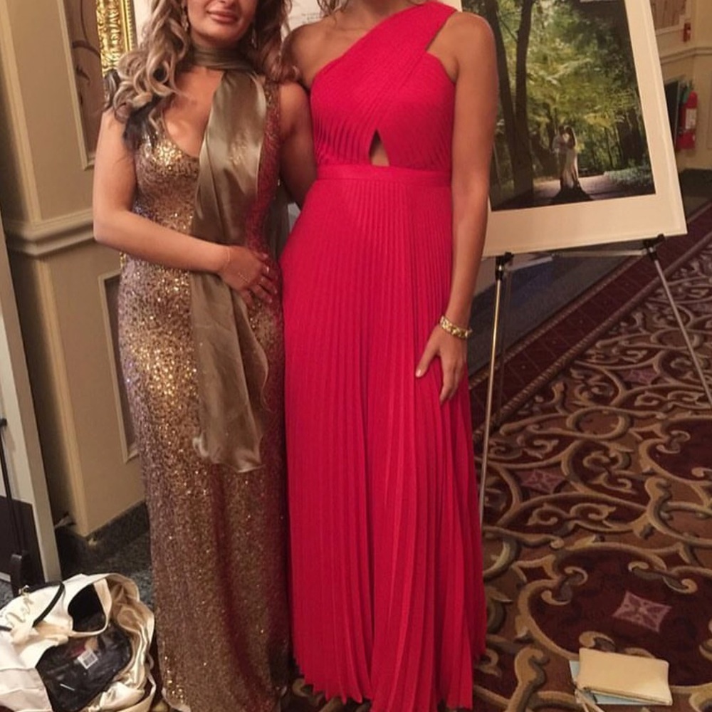One shoulder strap long red dress.